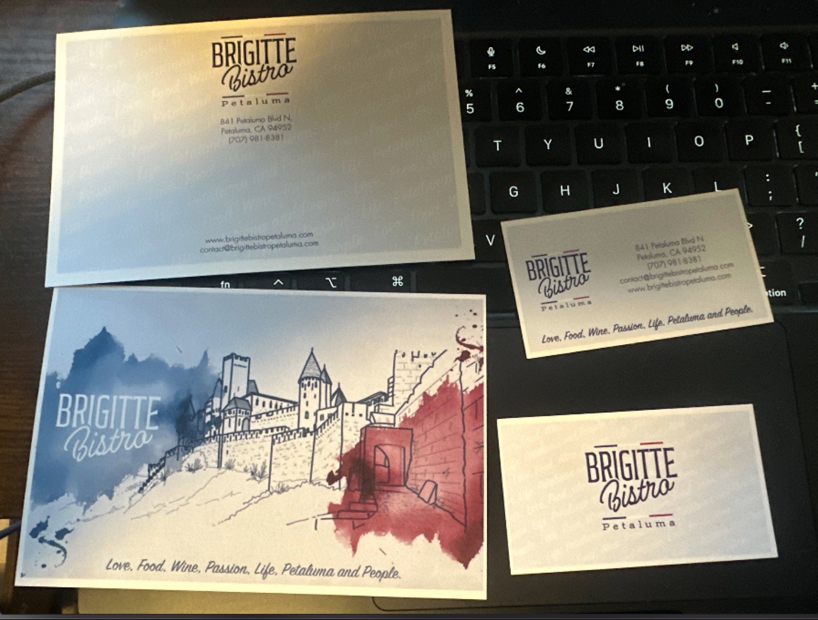Brigitte Bistro postcard with the castle illustration, business cards and letterhead
